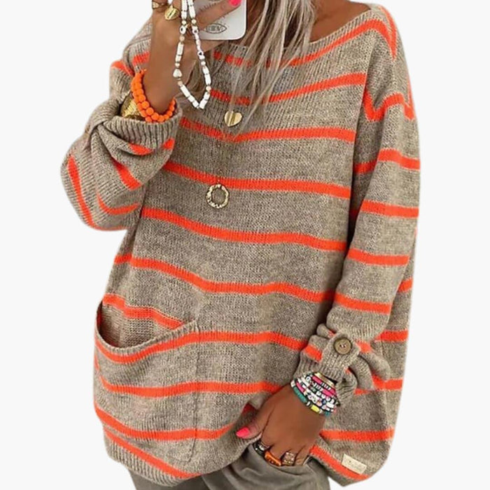 Pull pour femme à col bateau et poche sur le devant