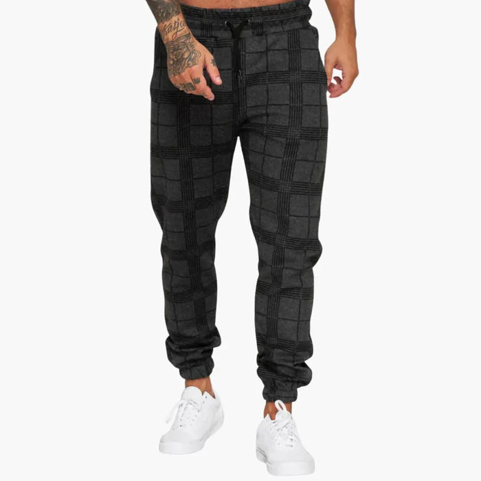 Pantaloni da jogging da uomo con motivo a quadri e polsini in pile