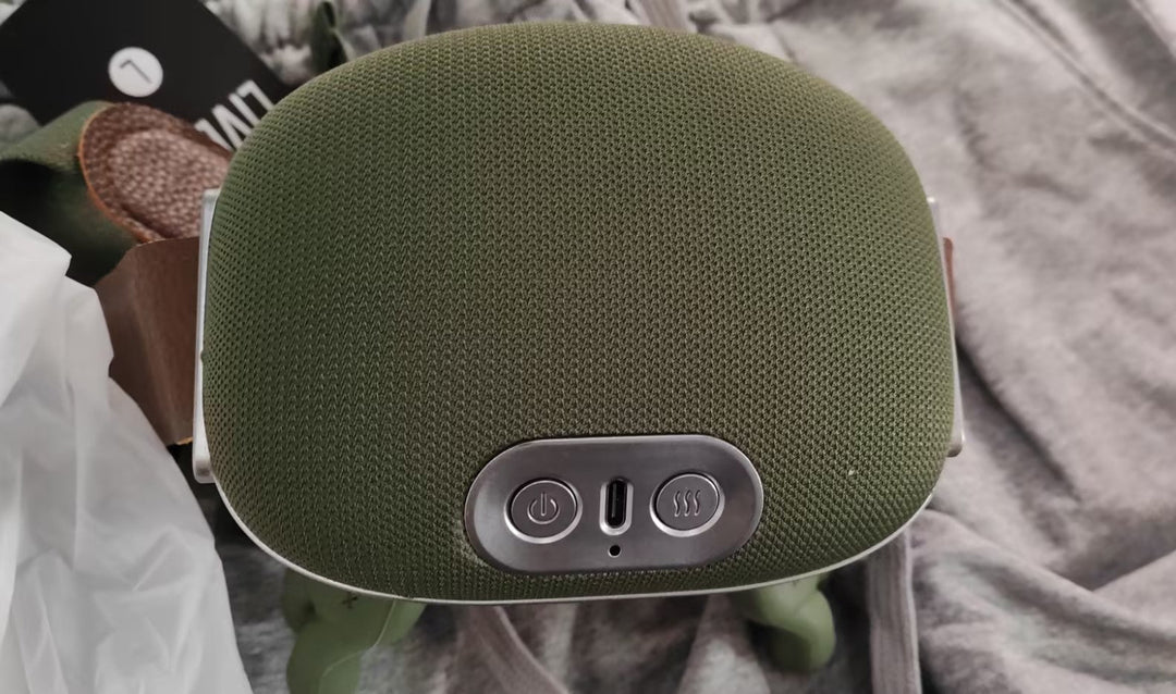 Grön sladdlös nackmassager med remmar
