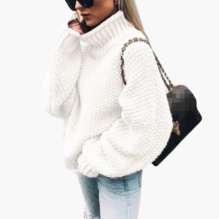 Maglione da donna in maglia con collo alto risvoltato e bordo a coste