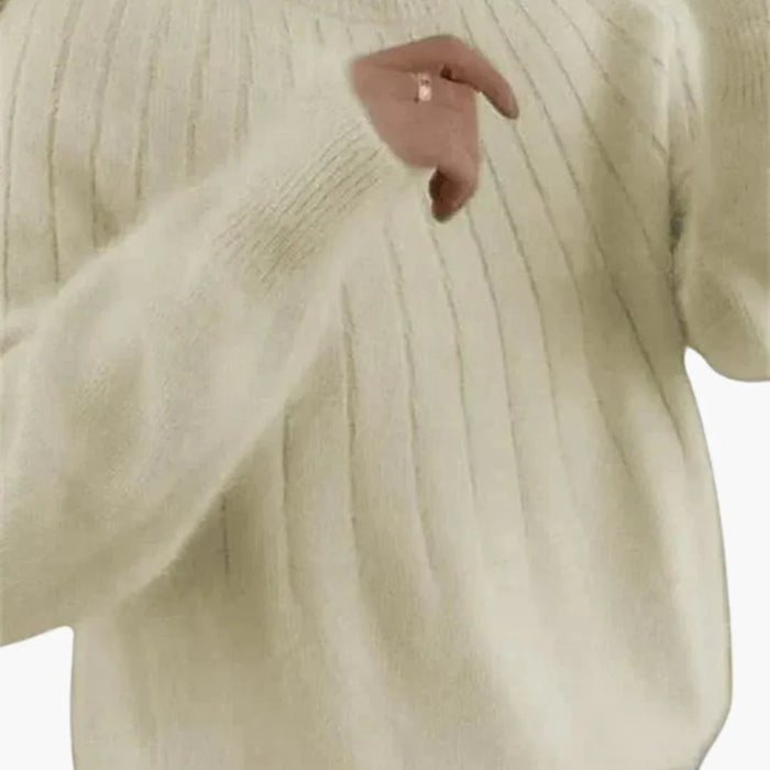Maglione da donna con superficie a coste e maniche lunghe