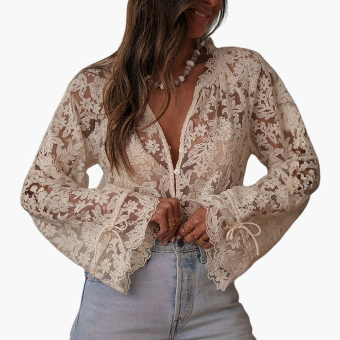 Damesblouse met geborduurd oppervlak en V-hals