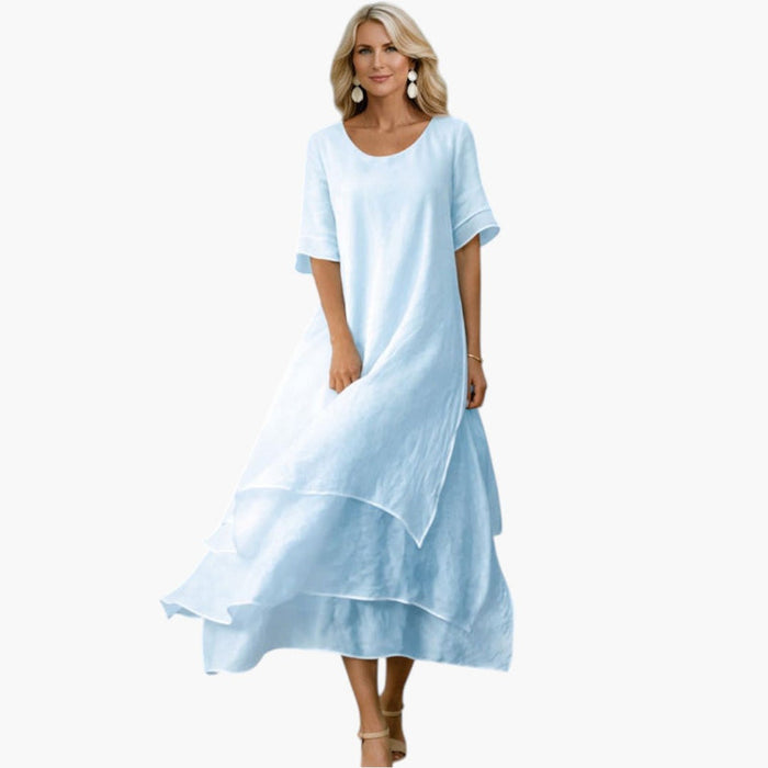 Vestito da donna con scollo aperto e gonna fluente