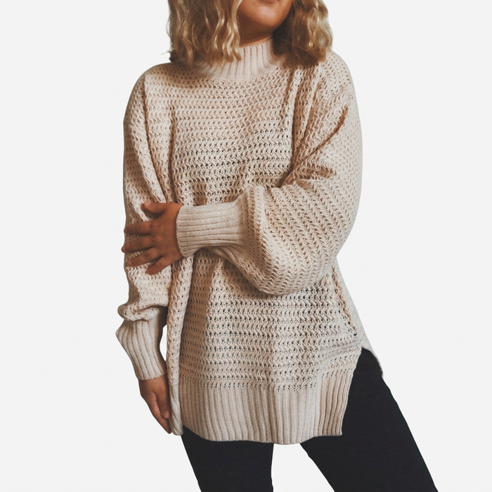 Maglione da donna in maglia testurizzata, collo alto e taglio lungo