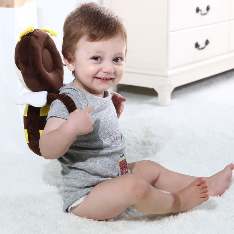 Babyhode pillow for småbarns head - and back safeguard