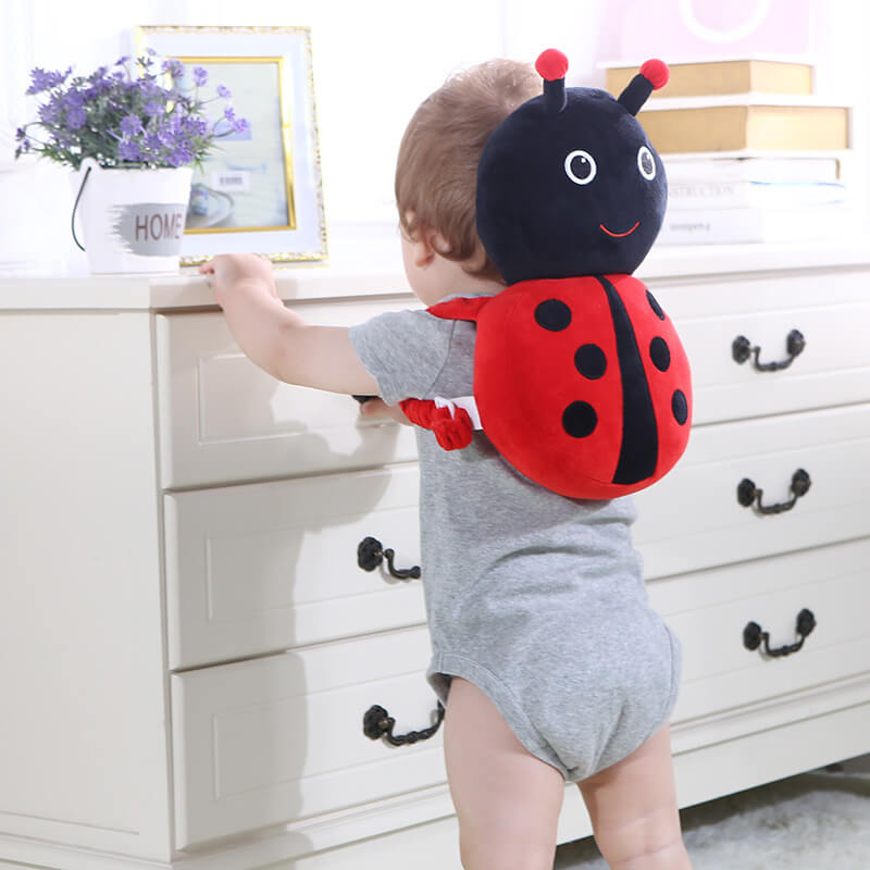 Babyhode pillow for småbarns head - and back safeguard