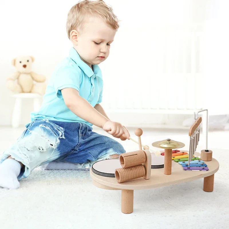 Children one musical take place three toy station with xylophone and trom more