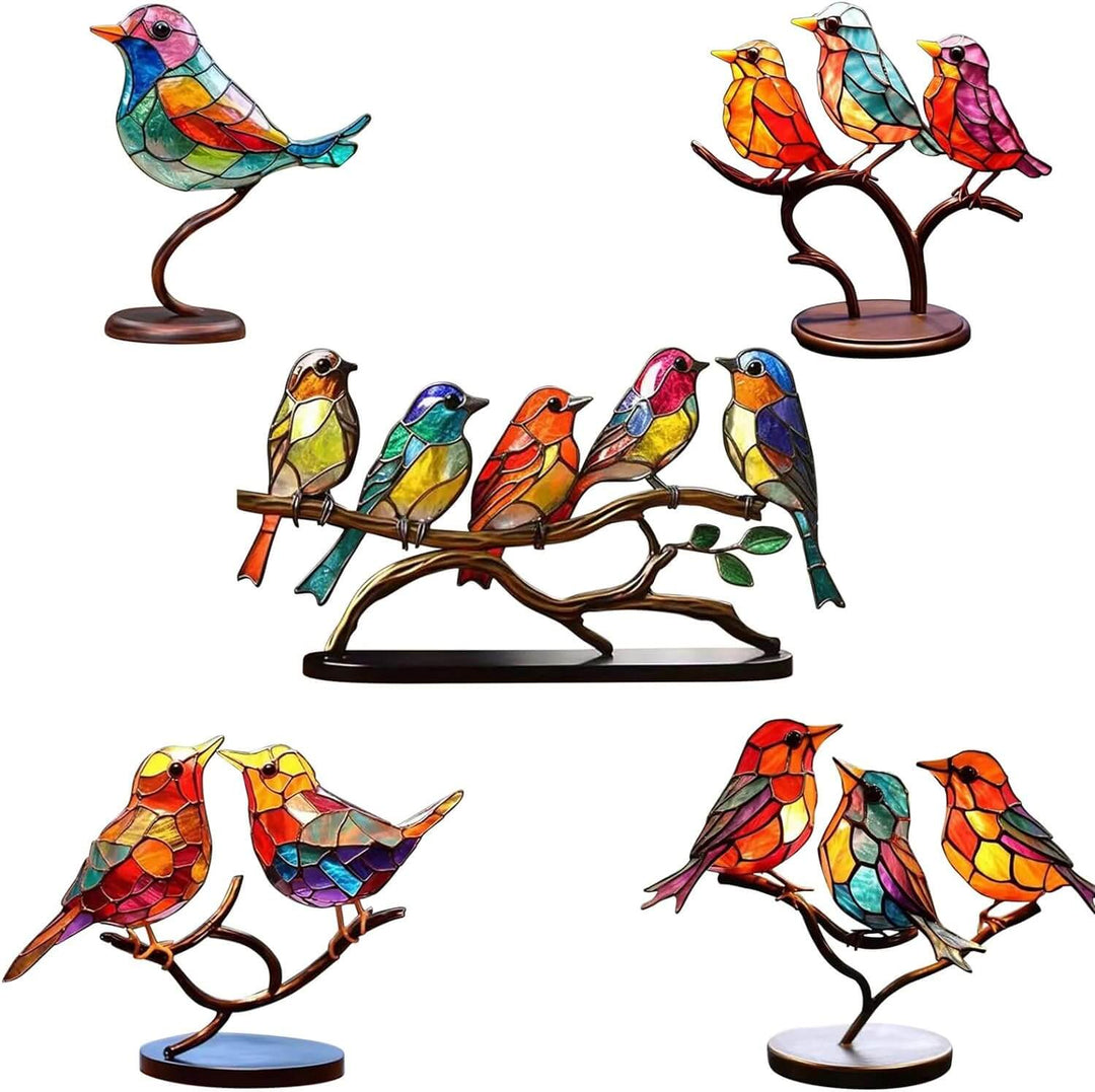 Decorative sculpture with brightly-coloured fugler on branch