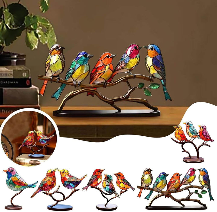 Decorative sculpture with brightly-coloured fugler on branch