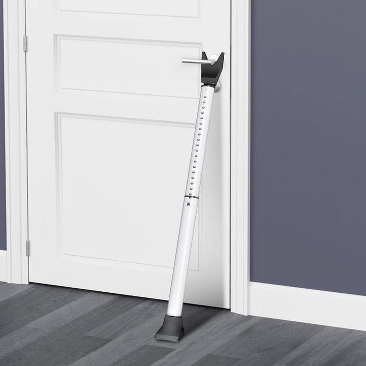 Adjustable dörsikkerhetsstang for maximal hamper security
