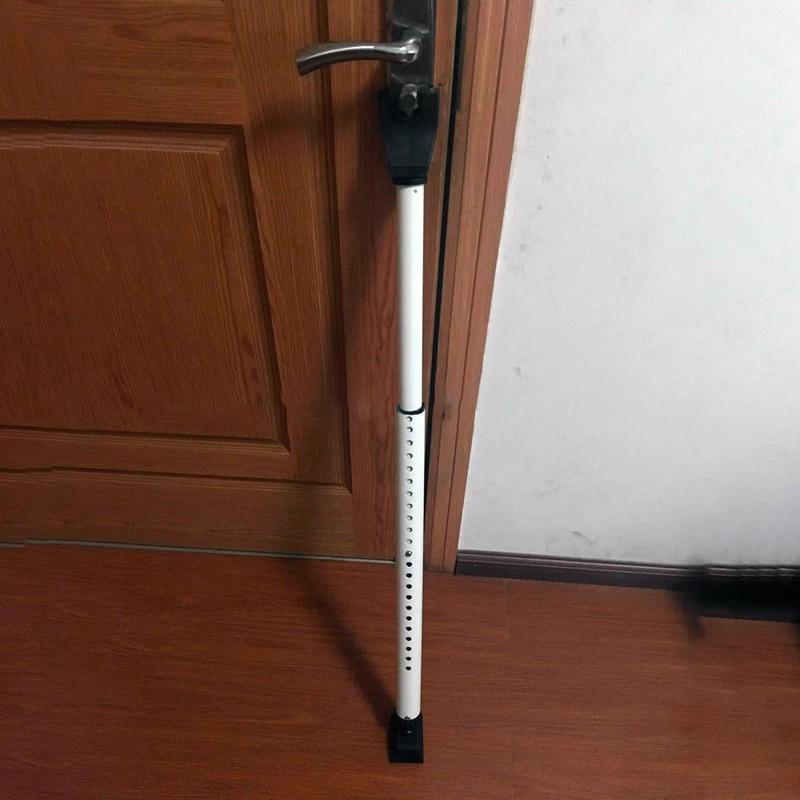 Adjustable dörsikkerhetsstang for maximal hamper security